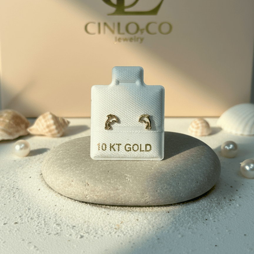 Cinlo Co jewelry box with gold earrings on a neutral background