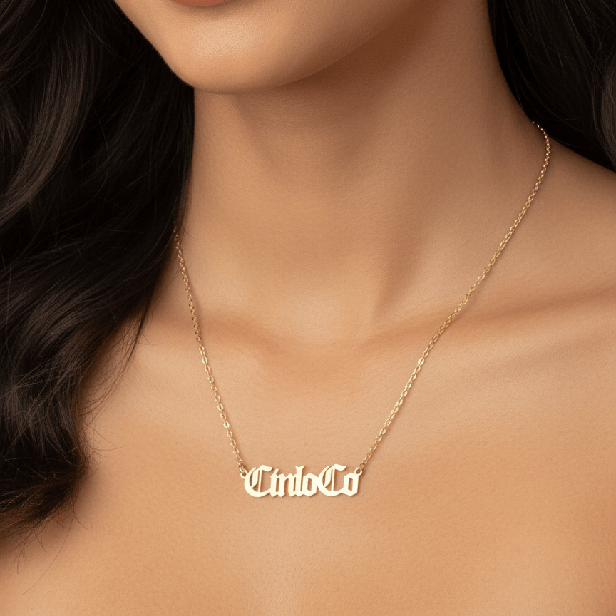 Necklace with silver custom name plate pendant on a black stand
