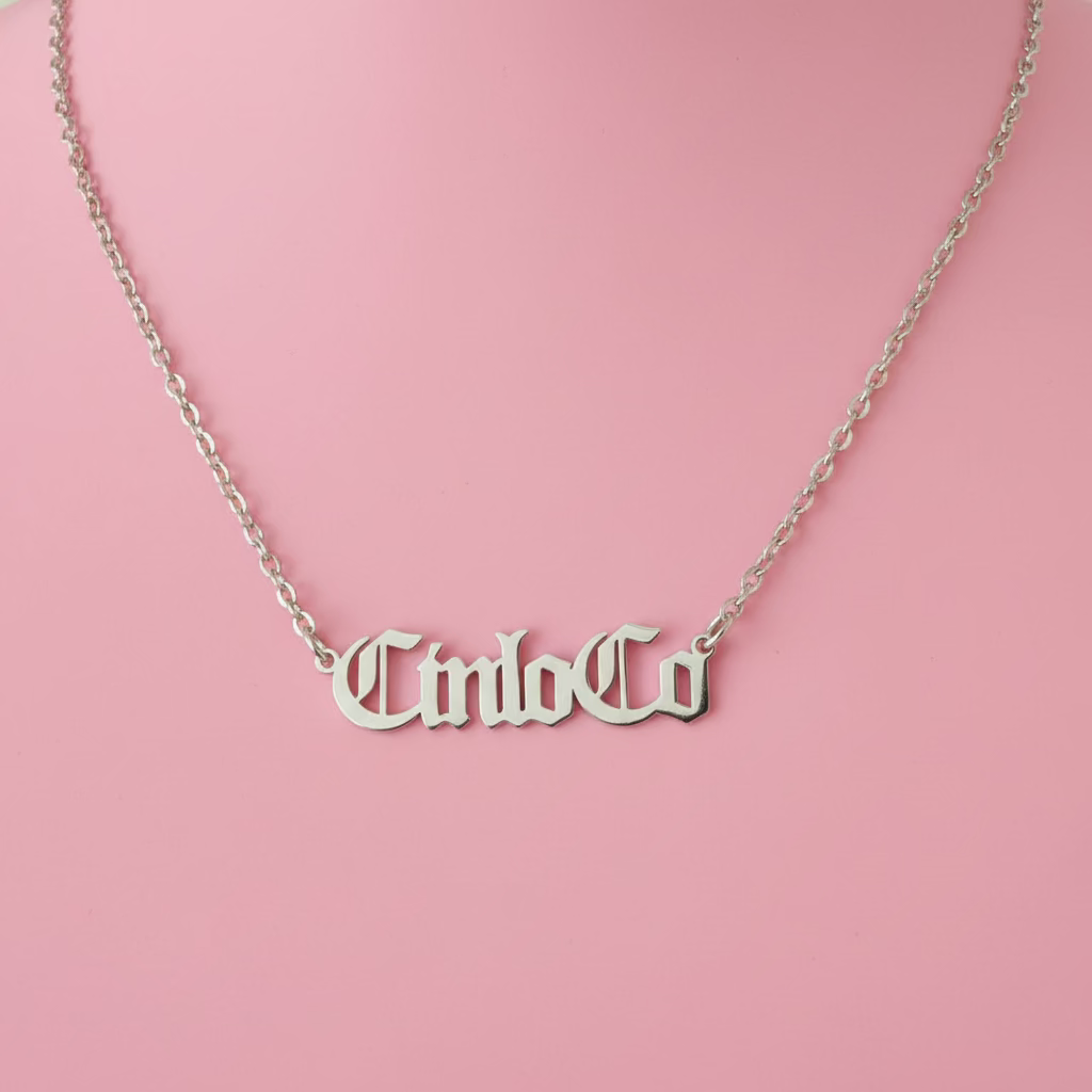 Necklace custom name plate necklace pendant on a black stand