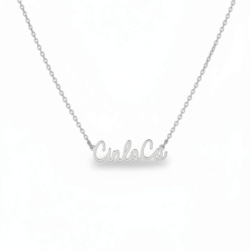 Silver necklace with 'Cinco' pendant on a white background