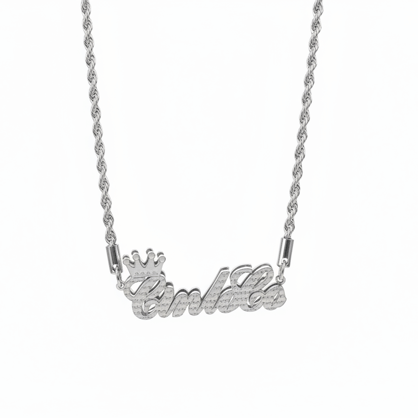 Silver necklace with 'Amelie' pendant on a white background