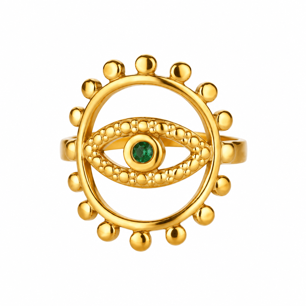 Gold ring with eye design and measurements on a white background