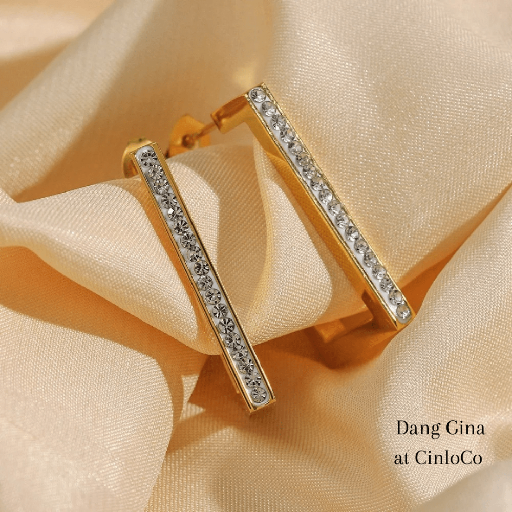 Gold rectangular hoop earrings with rhinestones