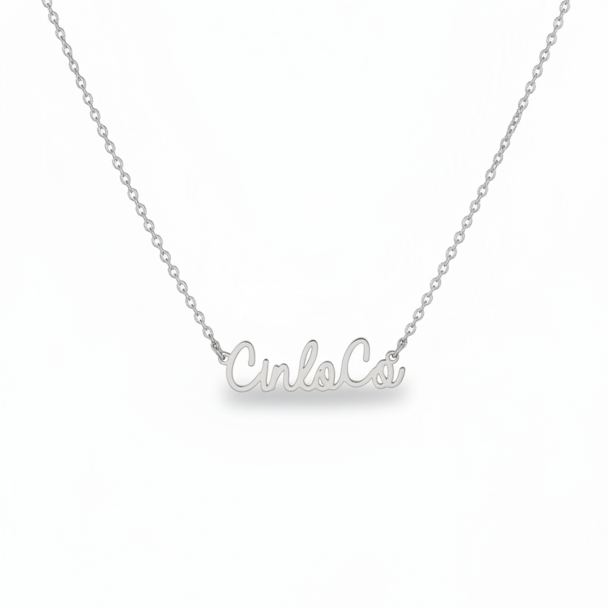 Silver necklace with 'Cinco' pendant on a white background