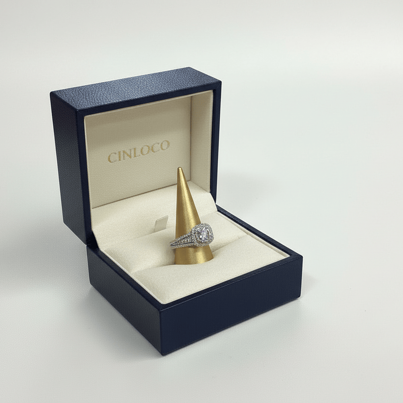 Gold ring with a diamond in a blue Einlogg box on a light gray background