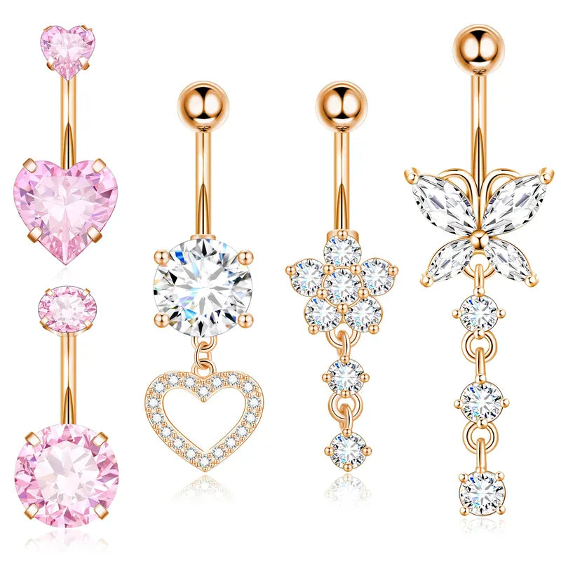 Four rose gold belly button piercings with pink and clear gemstones, displayed on a clean white background.
