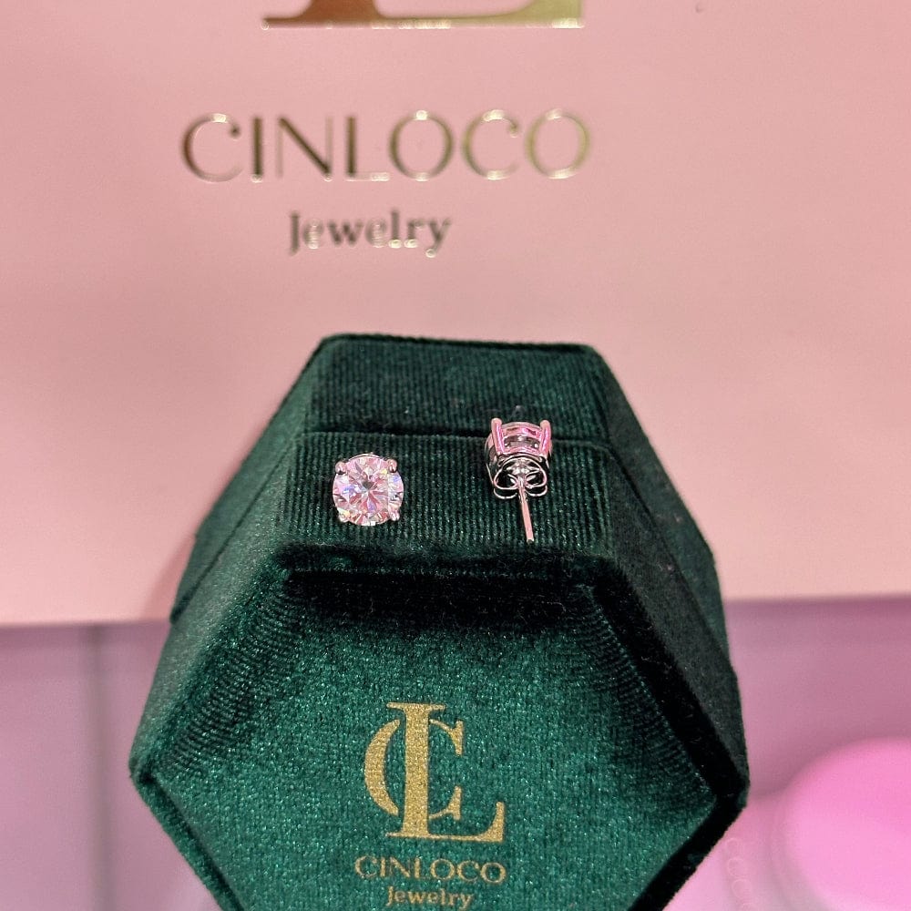 Green jewelry box with pink earrings on a pink background, featuring the Cinlcoo Jewelry logo.