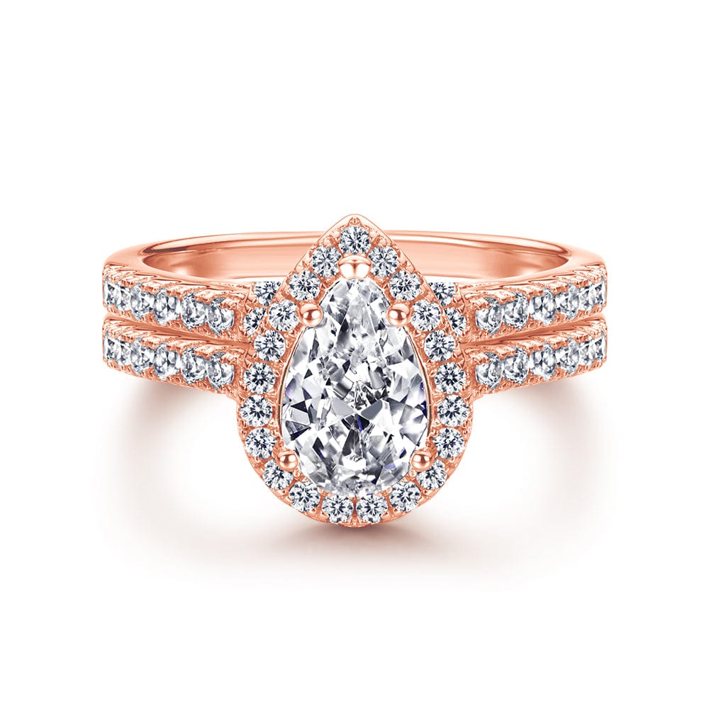 Pear cut halo moissaniteThe Jasmine ring set is a Pear cut halo moissanite sterling silver with 18k rose gold platting - CinloCo